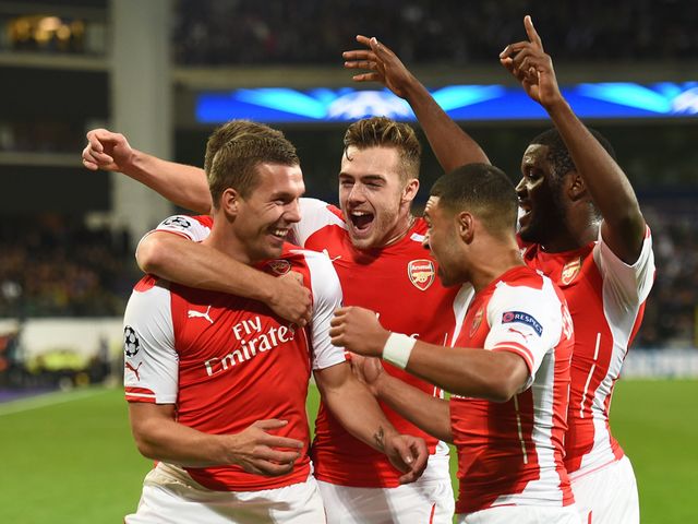 Lukas Podolski enjoys his winner for Arsenal at Anderlecht