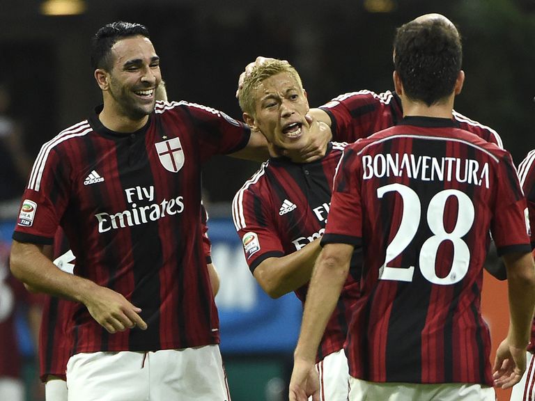 Keisuke Honda celebrates after netting AC Milan's second goal