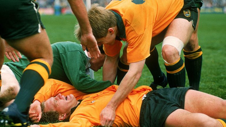 Michael Lynagh is too tired to celebrate after scoring the try that sent the Wallabies into the 1991 semi-final at the expense of Ireland
