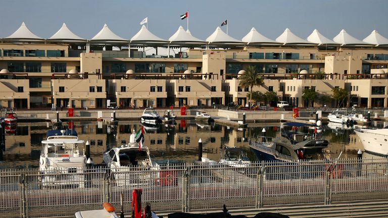 The McLaren-Honda is recovered to the pits at the 2014 Abu Dhabi test