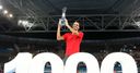 Federer notches 1,000th win