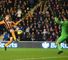 Nikica Jelavic lifts the ball over Everton's Joel Robles to score