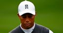 Woods out of top 100