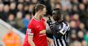 Evans denies spit charge
