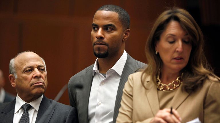 Darren Sharper (centre) appears in court along with his attorneys Blair Berk (right) and Leonard Levine (left)