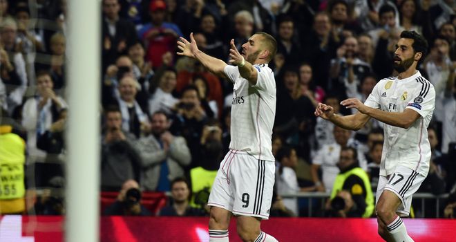 Karim Benzema celebrates on an edgy night for Real