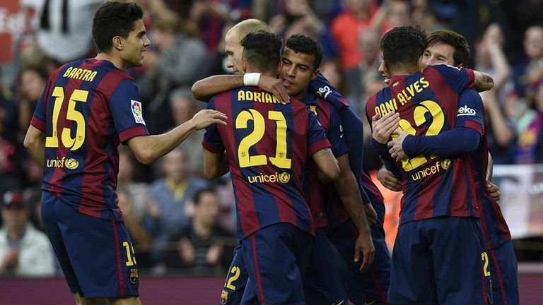 Barcelona's players celebrate after scoring against Getafe 