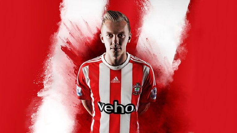 Adidas stick with the red and white stripes for Southampton's home kit