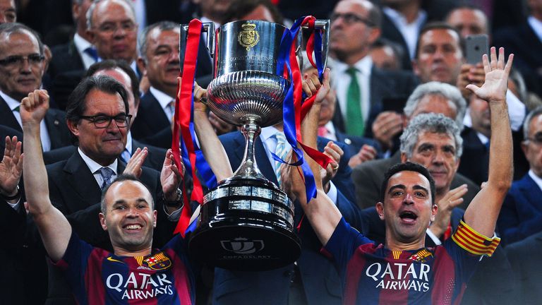 Iniesta, left, has won La Liga eight times with Barcelona