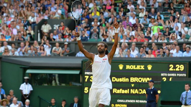 Brown celebrates a famous win on Centre Court
