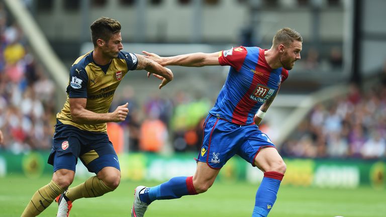 Connor Wickham (right) of Crystal Palace in action against Arsenal