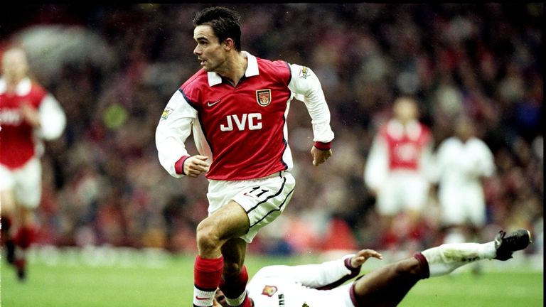 Scott revealed how she would receive Marc Overmars' size five hand-me-down boots