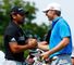 Jordan Spieth (right) will be defending his crown at the Australian Open against Jason Day