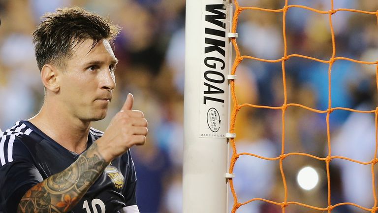 Lionel Messi celebrates victory over Bolivia.