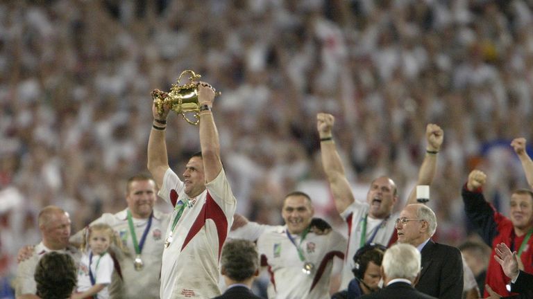 England captain Martin Johnson hoists the Webb Ellis Cup