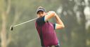 Poulter stays in Hong Kong hunt