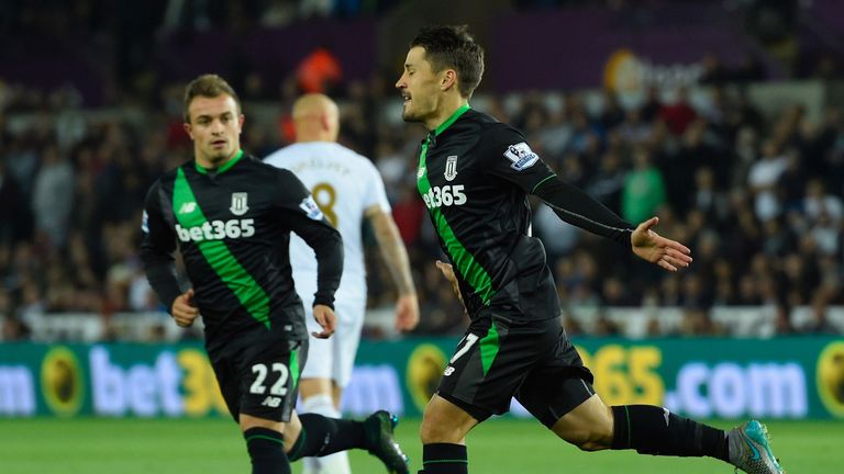 Bojan (right) celebrates after scoring from the penalty spot