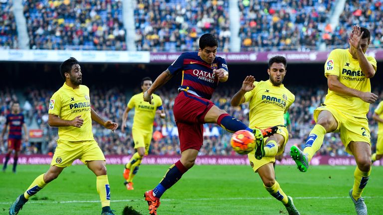 Luis Suarez goes for goal against Villarreal