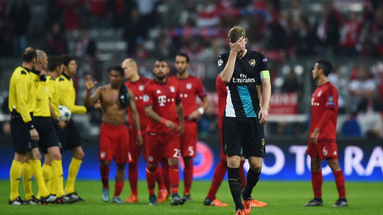 Arsenal's Per Mertesacker shows the strain after his side's 5-1 defeat to Bayern