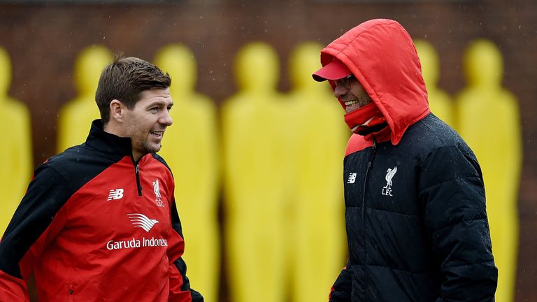 Jurgen Klopp (right) talks to former Liverpool midfielder Steven Gerrard, who has returned to the club to train