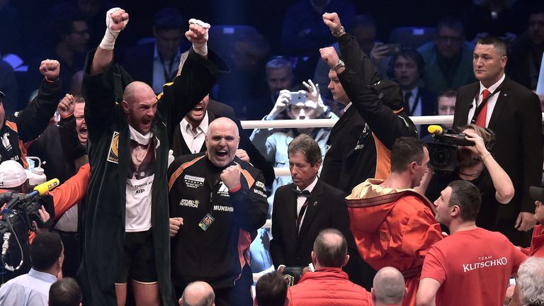 Tyson Fury celebrates after winning his fight against Wladimir Klitschko