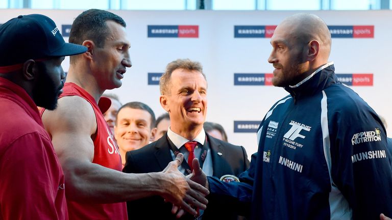 Fury and Wladimir Klitschko's fight will go ahead after a row over the ring