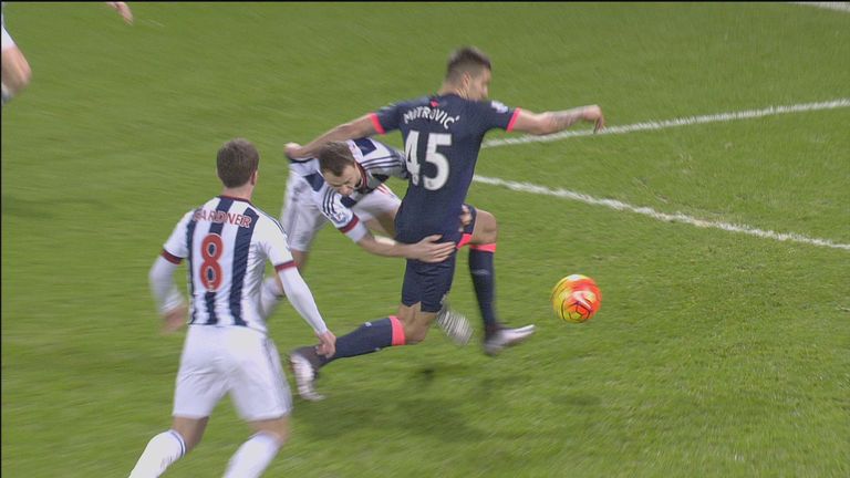 Aleksander Mitrovic was brought down inside the penalty area by Jonny Evans, but was not awarded a spot kick