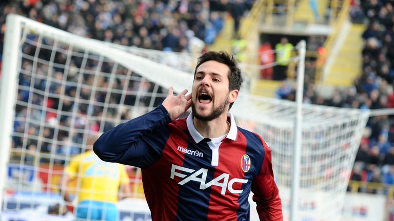 Mattia Destro celebrates after scoring the opening goal for Bologna against Napoli