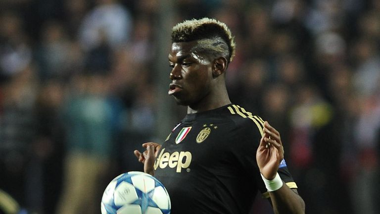 Juventus midfielder Paul Pogba makes the side in central midfield