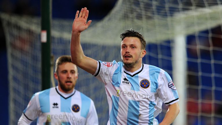 Mangan celebrates his decisive strike