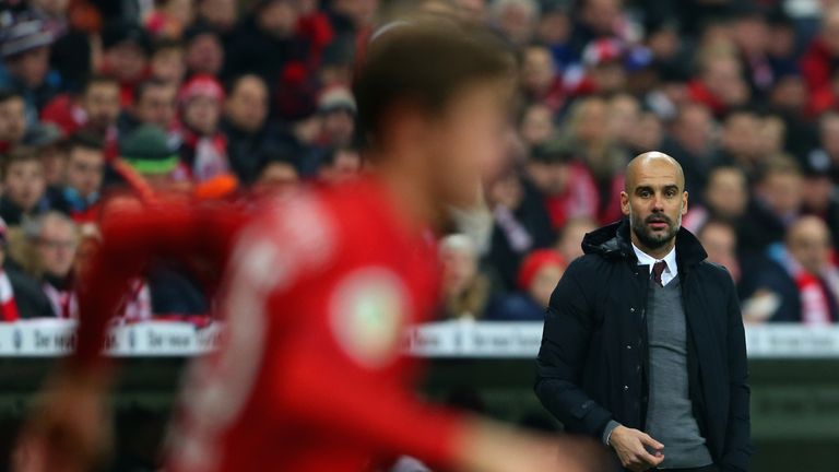 Guardiola watches his Bayern Munich side from the sidelines