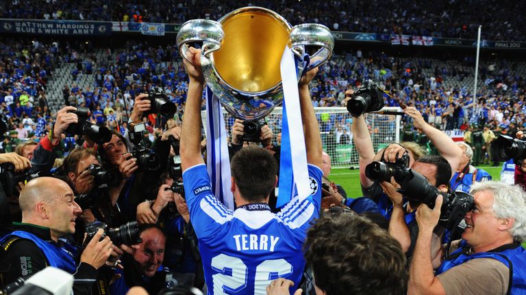 Terry lifts the Champions League trophy in 2012 after missing the final through suspension