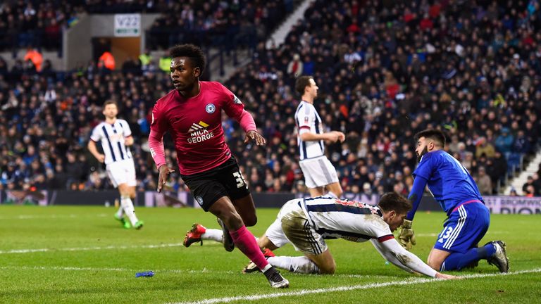 Shaquile Coulthirst celebrates scoring Peterborough's first goal