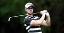 Holman holds off Bland charge