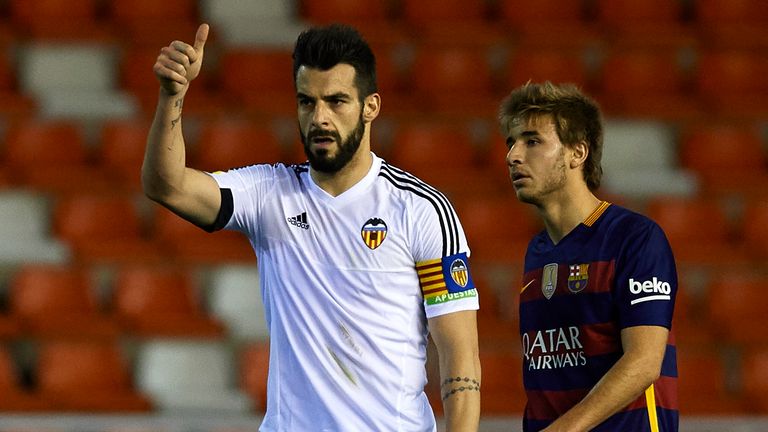Valencia striker Alvaro Negredo celebrates after opening the scoring against Barcelona