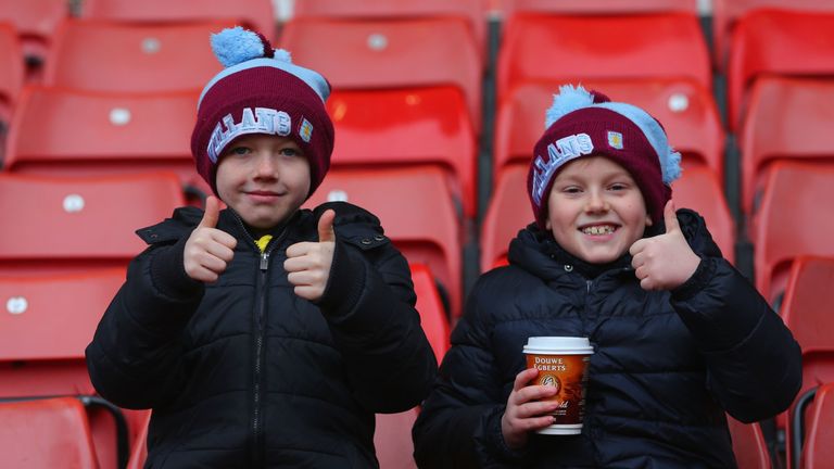 Young Villa supporters look positive prior to the match at the Britannia Stadium
