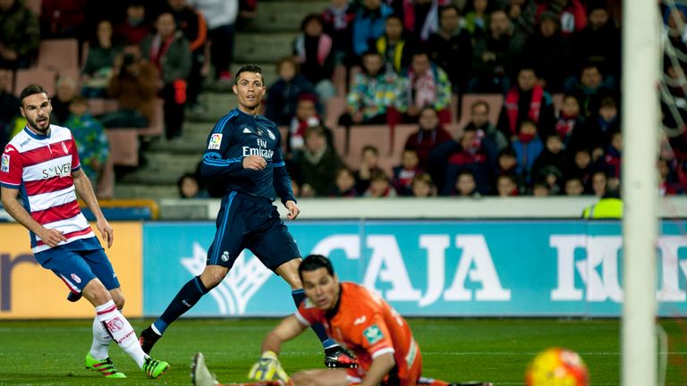 David Rodriguez Lomban and goalkeeper Andres see out a Cristiano Ronaldo effort.