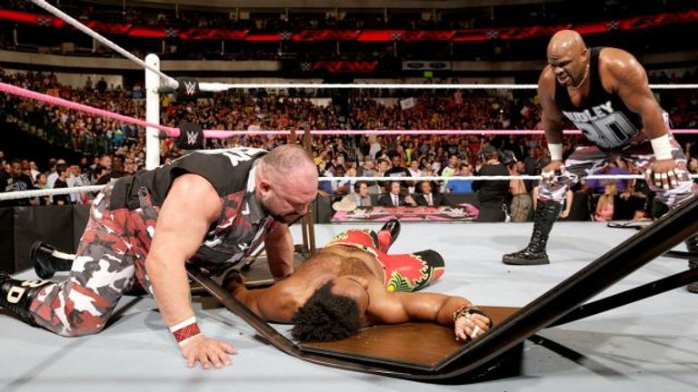 The Dudley Boyz just love putting people through tables