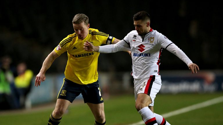 MK Dons' Jake Forster-Caskey and Middlesbrough's Grant Leadbitter battle for the ball