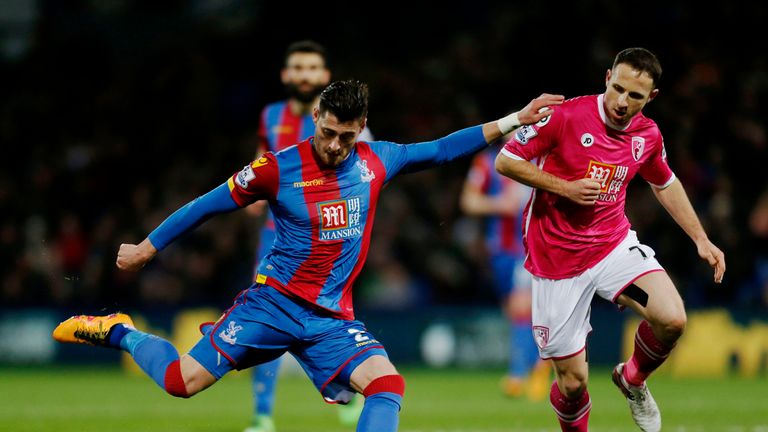Crystal Palace's Joel Ward and Bournemouth's Marc Pugh battle for the ball during the game at Selhurst Park.
