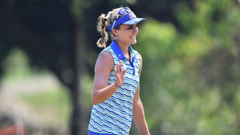 Thompson acknowledges the fans during the final round at the Siam Country Club