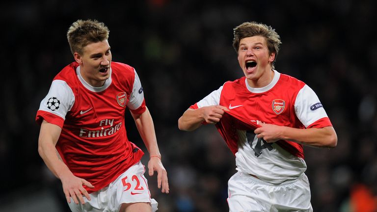 Nicklas Bendtner and Andrey Arshavin celebrate scoring the winner against Barcelona in 2011