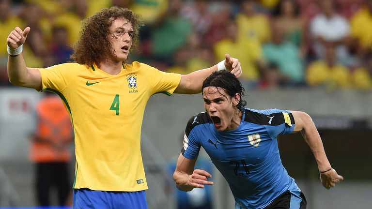 Edinson Cavani (right) scored Uruguay's first goal in Recife