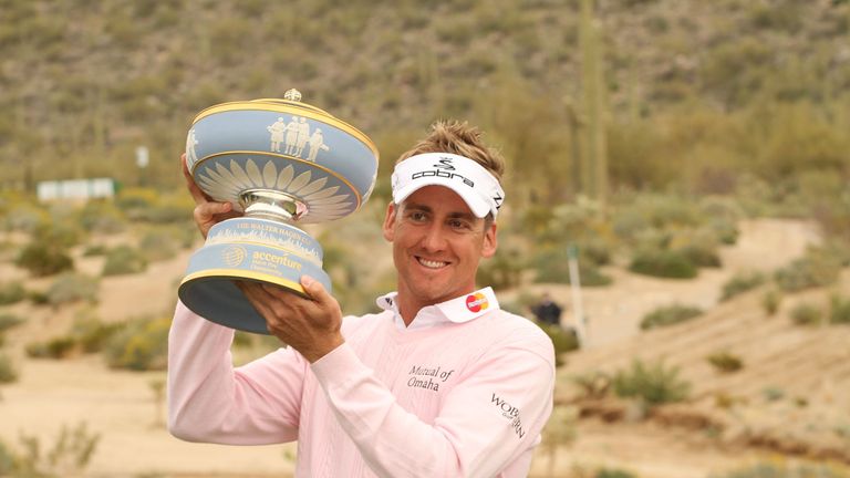 Poulter lifts the trophy following his Match Play success in 2010