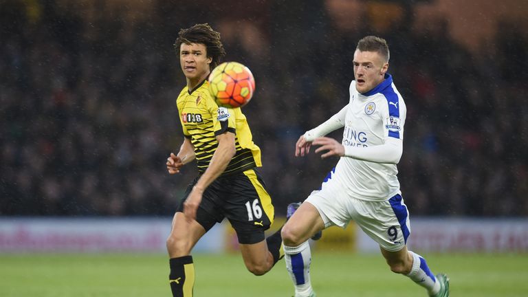 Nathan Ake and Jamie Vardy compete for the ball