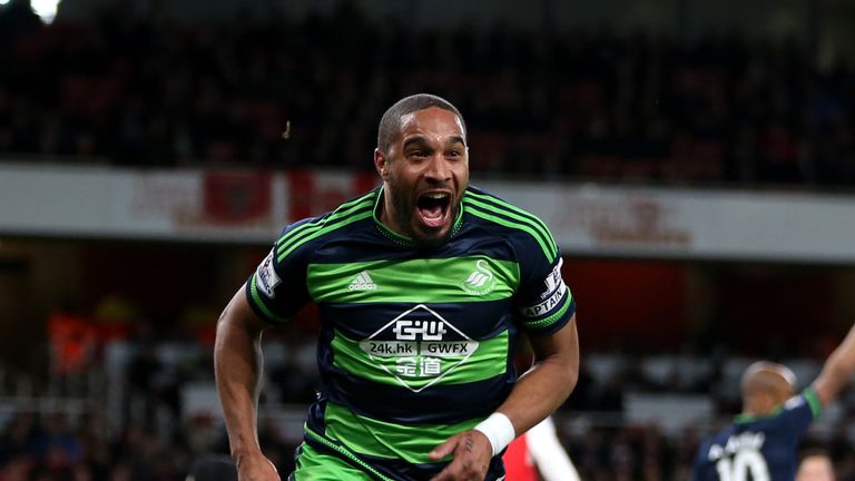 Ashley Williams celebrates scoring Swansea's winner at Arsenal