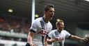 Spurs keep title chase alive