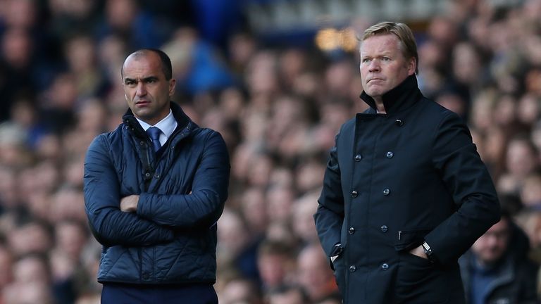 Koeman could take over from former Everton boss Roberto Martinez (left)