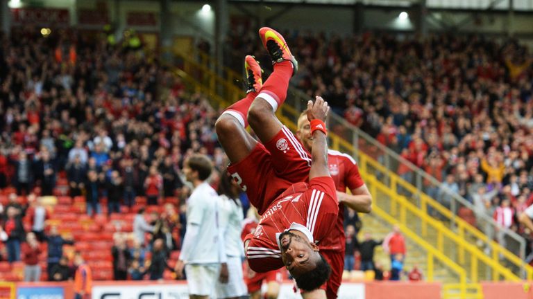 Defender Shay Logan signs a new deal to stay at Aberdeen Defender Shay Logan signs a new deal to stay at Aberdeen