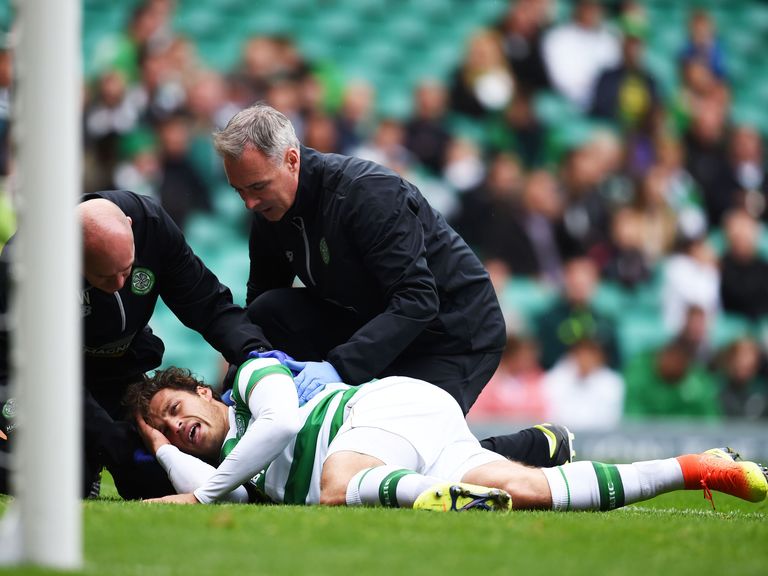 Celtic's Erik Sviatchenko is treated on the pitch